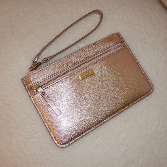 kate spade Handbags - Kate Spade Laurel Way Tinie Wristlet